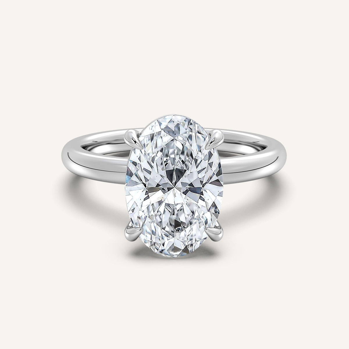 Oval lab-grown diamond solitaire engagement ring in 14k white gold, the classic setting for a 2 carat stone