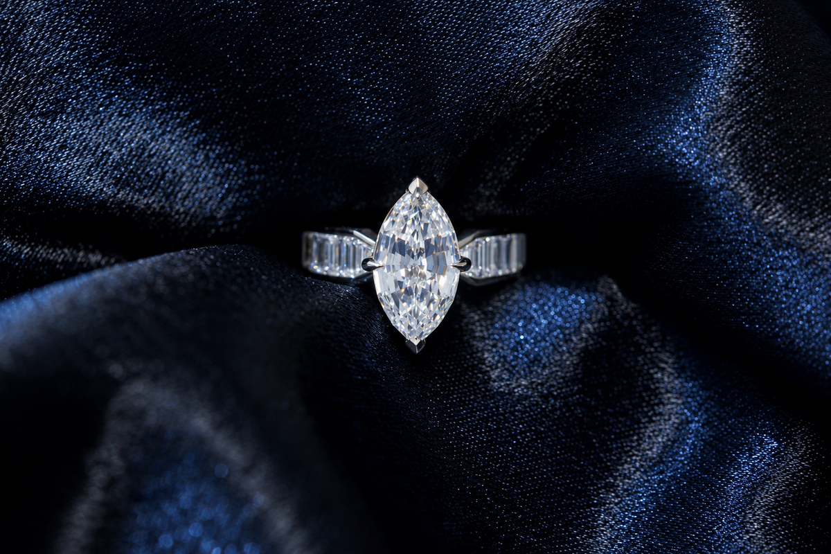 Marquise diamond ring on midnight blue silk