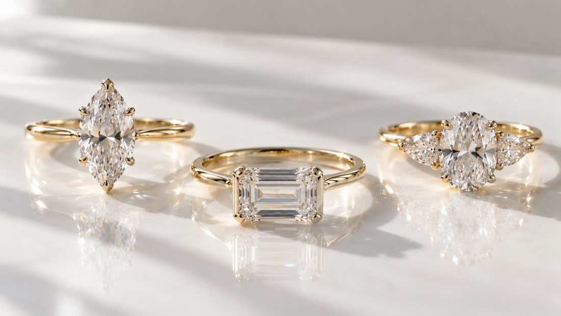 Three diamond engagement rings in soft light