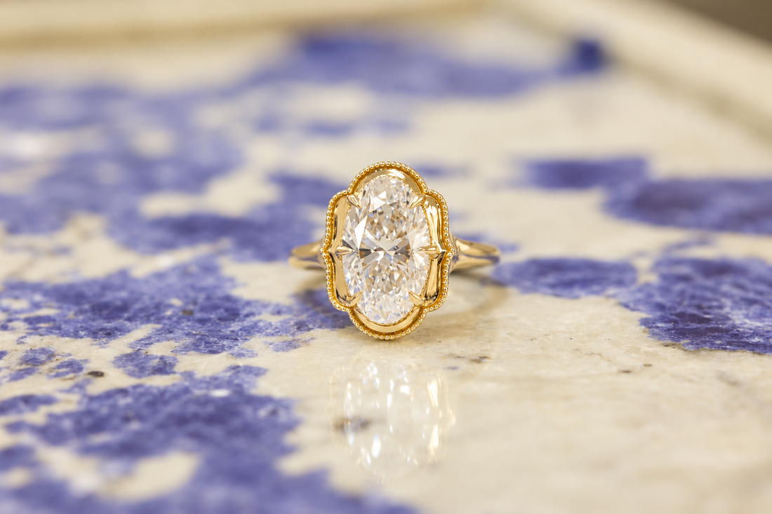 Vintage style gold halo engagement ring
