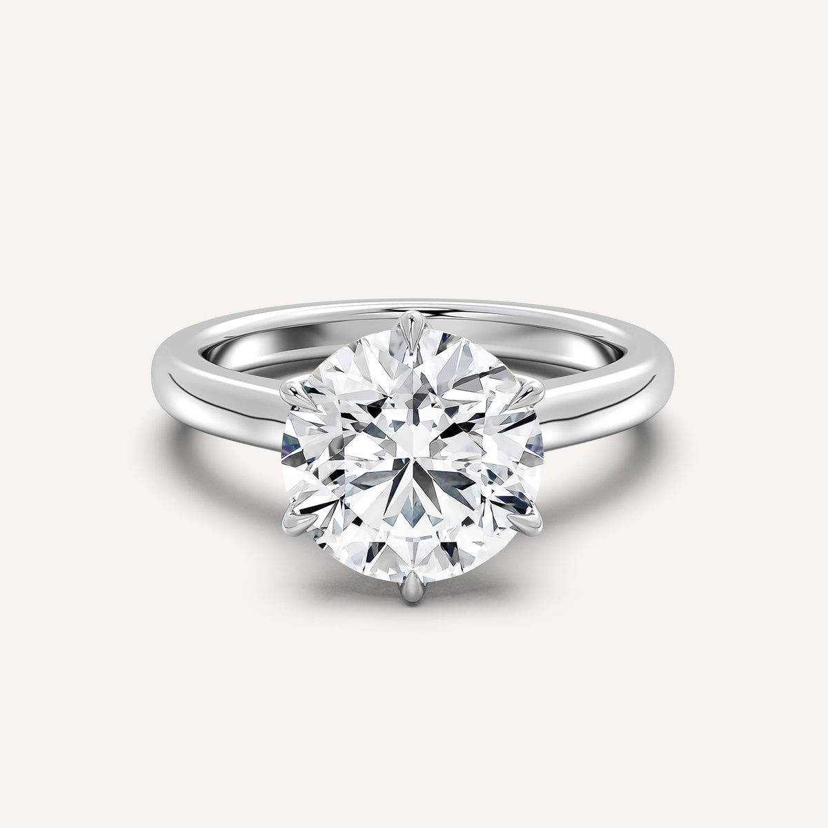 Round brilliant lab-grown diamond in a tulip cathedral engagement ring in 14k white gold