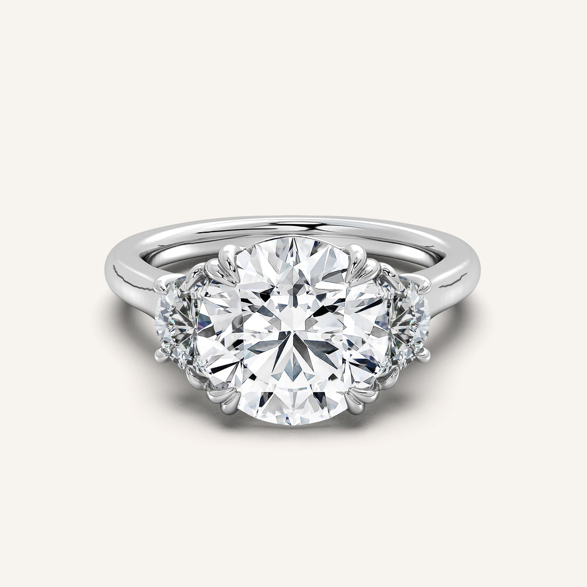 Round three stone engagement ring in 14k white gold set with lab-grown diamonds
