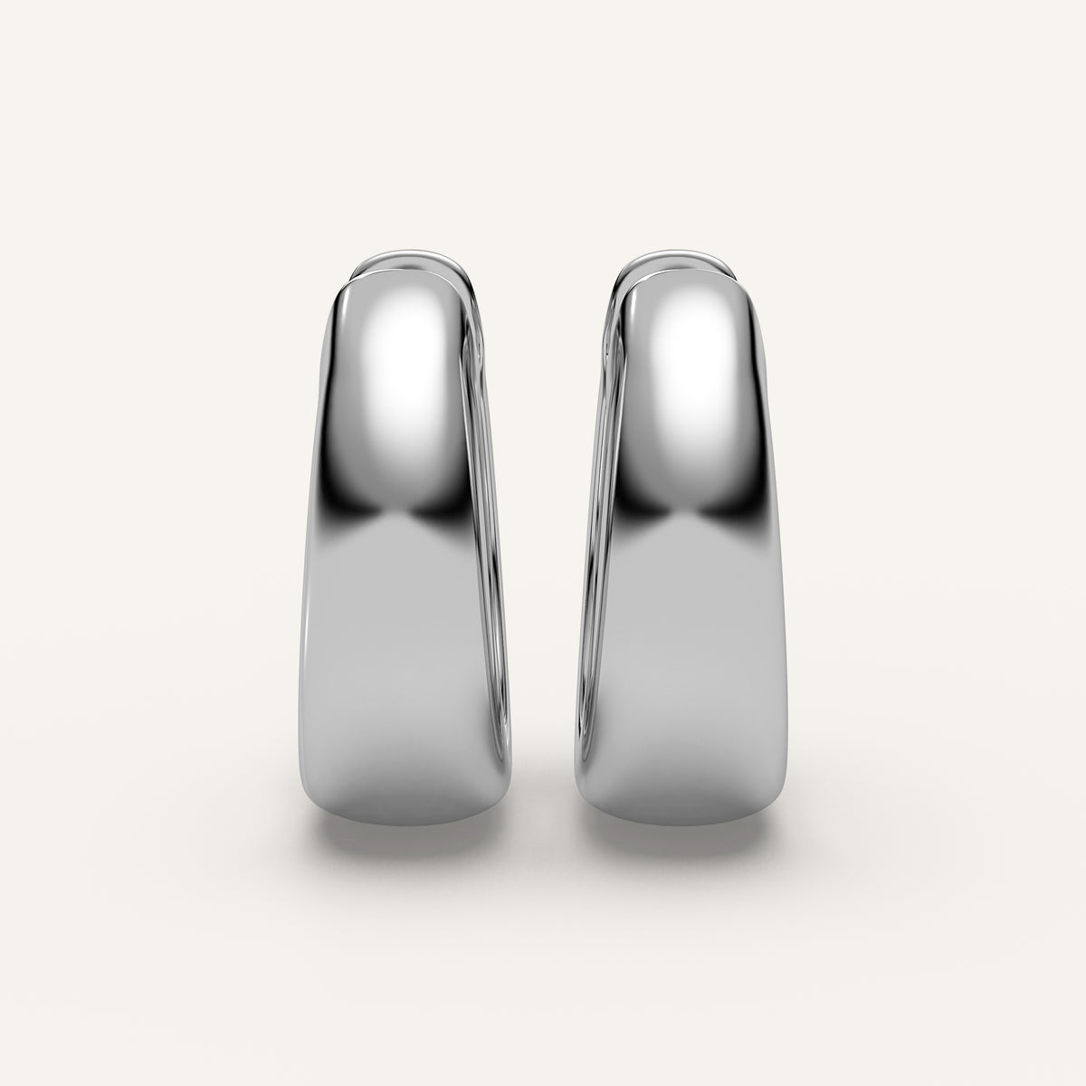 Chunky Gold Huggie Earrings in 14k White Gold (view 1)