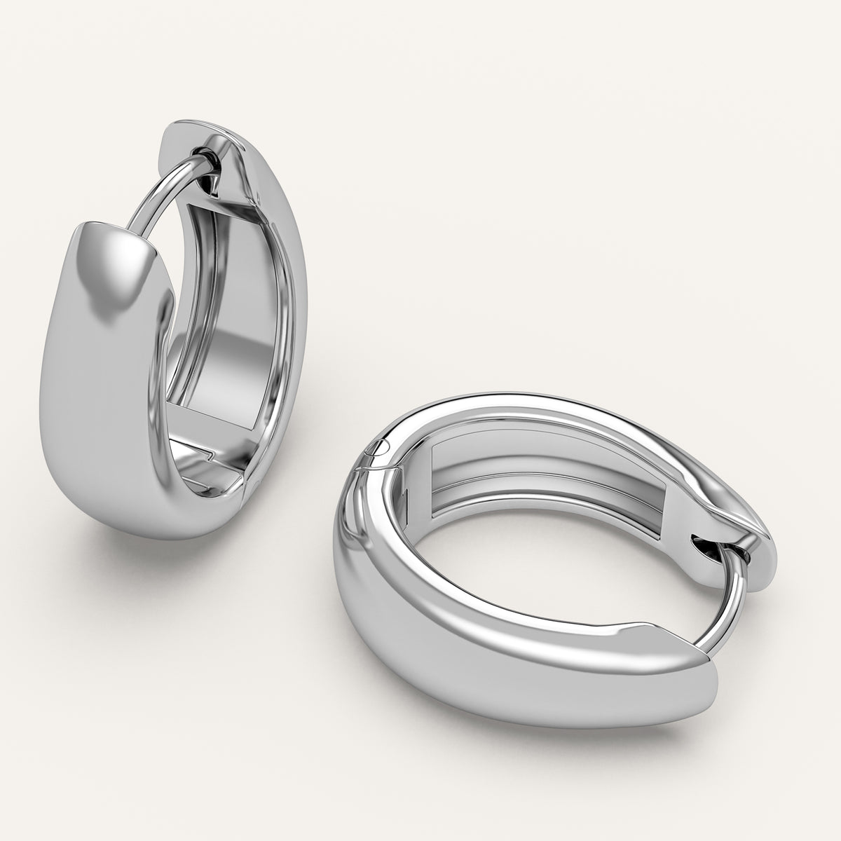 Chunky Gold Huggie Earrings in 14k White Gold (view 3)