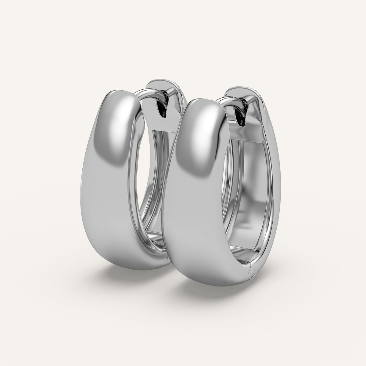 Chunky Gold Huggie Earrings in 14k White Gold (view 2)