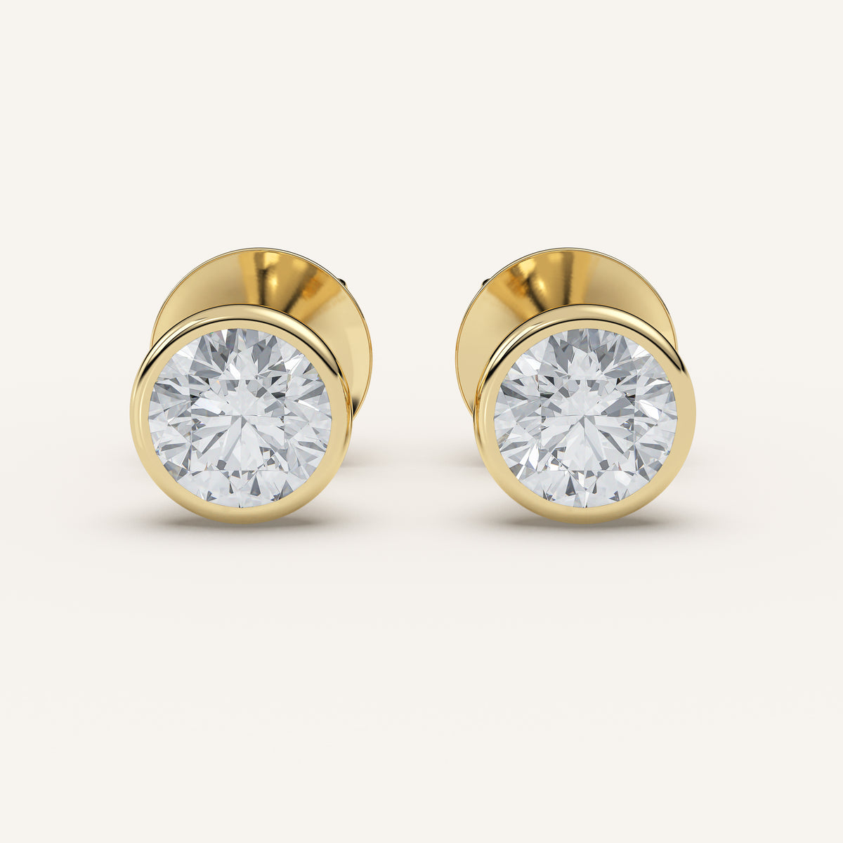 Emerald-Cut Bezel Diamond Stud Earrings — 2 CTW in 14k Yellow Gold (view 1)