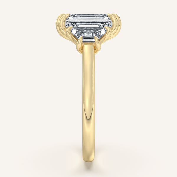Emerald Cut Three Stone Trapezoid Engagement Ring | 18k Yellow Gold