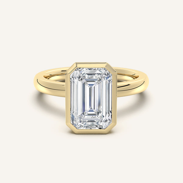 Emerald Cut Bezel Set Engagement Ring | 18k Yellow Gold