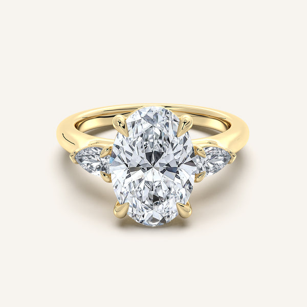 Oval Pear Shape Side Stone Ring | 18k Yellow Gold