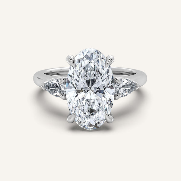Moval Pear Shape Side Stone Ring | Platinum