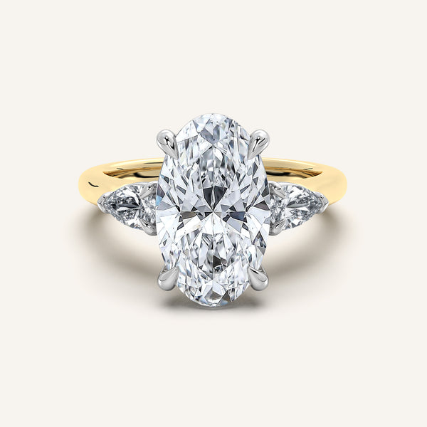Moval Pear Shape Side Stone Ring | 14k Two Tone Gold