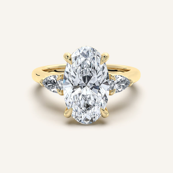 Moval Pear Shape Side Stone Ring | 18k Yellow Gold