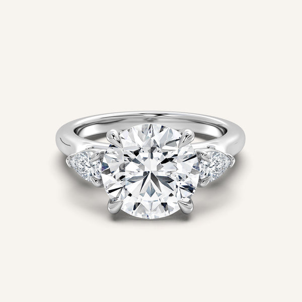 Round Pear Shape Side Stone Ring | Platinum