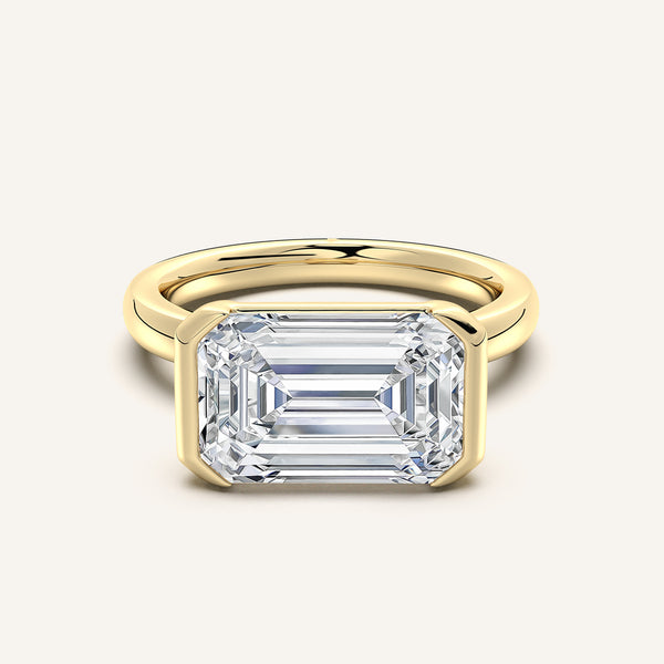 Emerald Cut East West Half Bezel Ring | 18k Yellow Gold