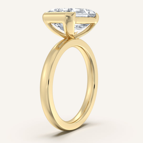 Emerald Cut East West Half Bezel Ring | 18k Yellow Gold