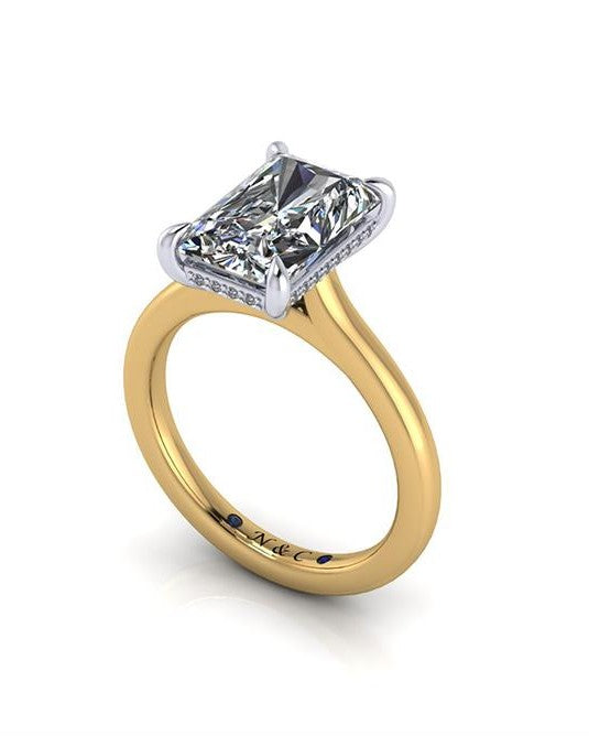 Elegant lab-grown diamond engagement ring with yellow gold band and halo setting