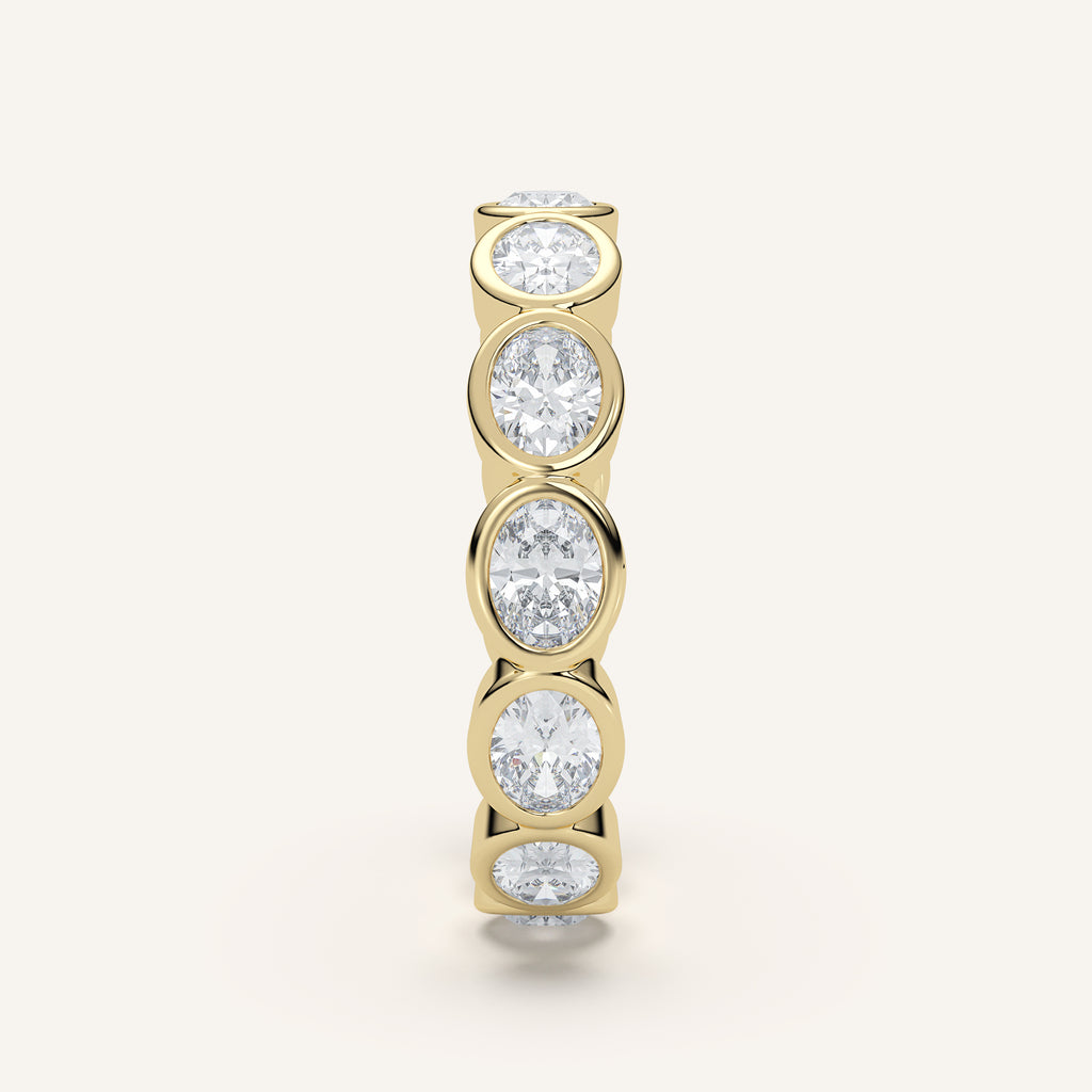 East-West Oval Bezel Eternity Band in 14k Yellow Gold (view 3)