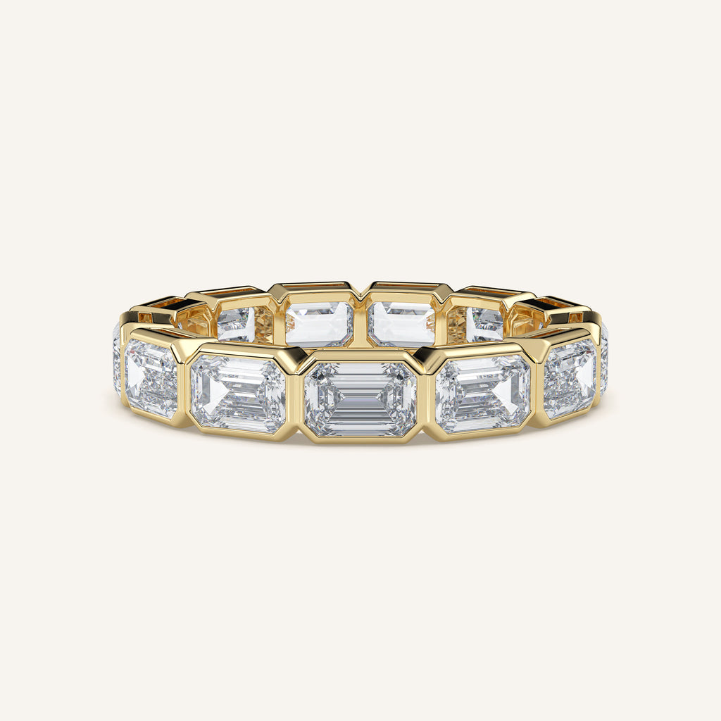 East-West Emerald-Cut Bezel Eternity Band — 3.5 CTW in 14k Yellow Gold (view 1)