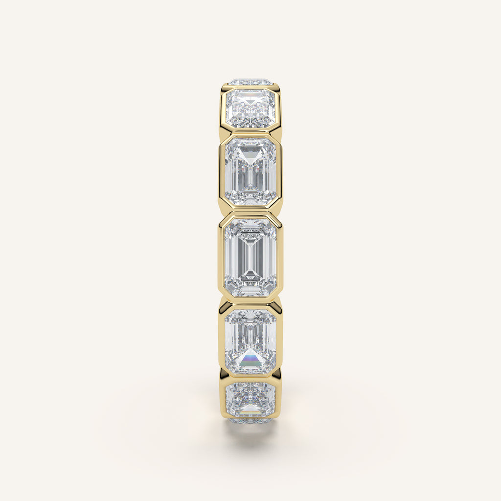 East-West Emerald-Cut Bezel Eternity Band — 3.5 CTW in 14k Yellow Gold (view 3)