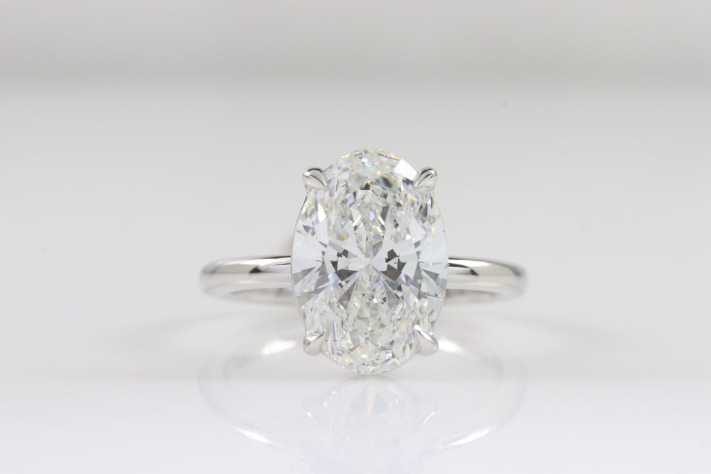 Amé Solitaire | 4.08ct E-VS1 Oval | 14k White Gold
