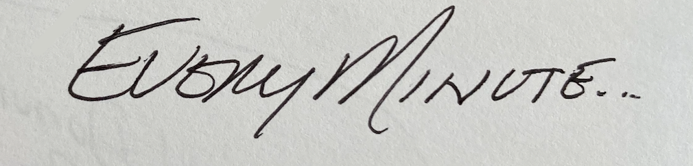 Handwritten cursive text 'Every Minute...' on textured paper, evoking romantic sentiment for engagement rings.