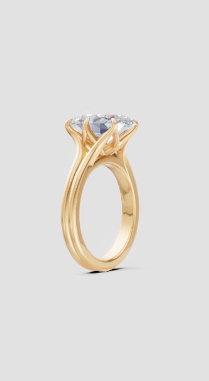 Elegant gold engagement ring with lab-grown diamond, ethical and sustainable design