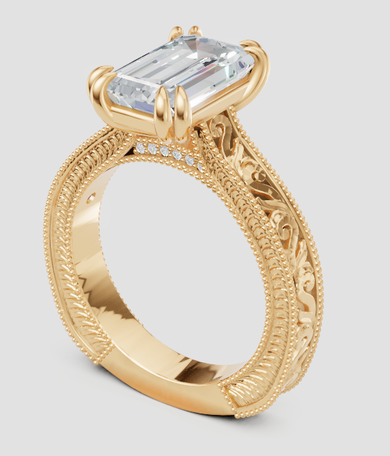 Elegant emerald cut lab-grown diamond engagement ring in gold with intricate filigree detailing