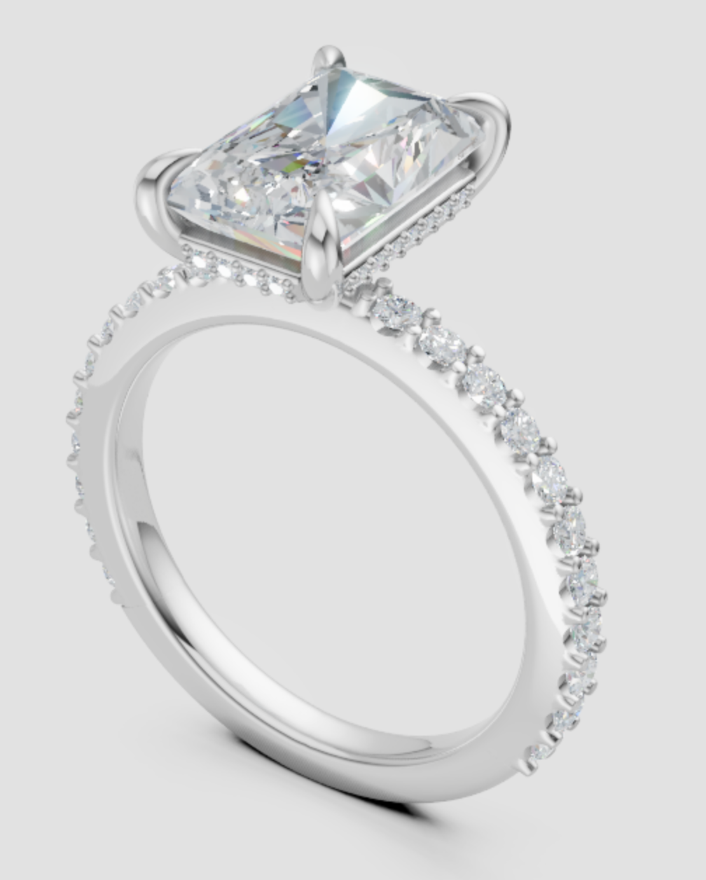 Lab-grown diamond engagement ring with princess cut center stone and pave band, ethical and sustainable