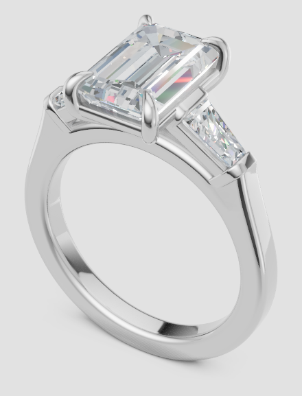 Elegant emerald cut lab-grown diamond engagement ring with side stones, ethical and sustainable design