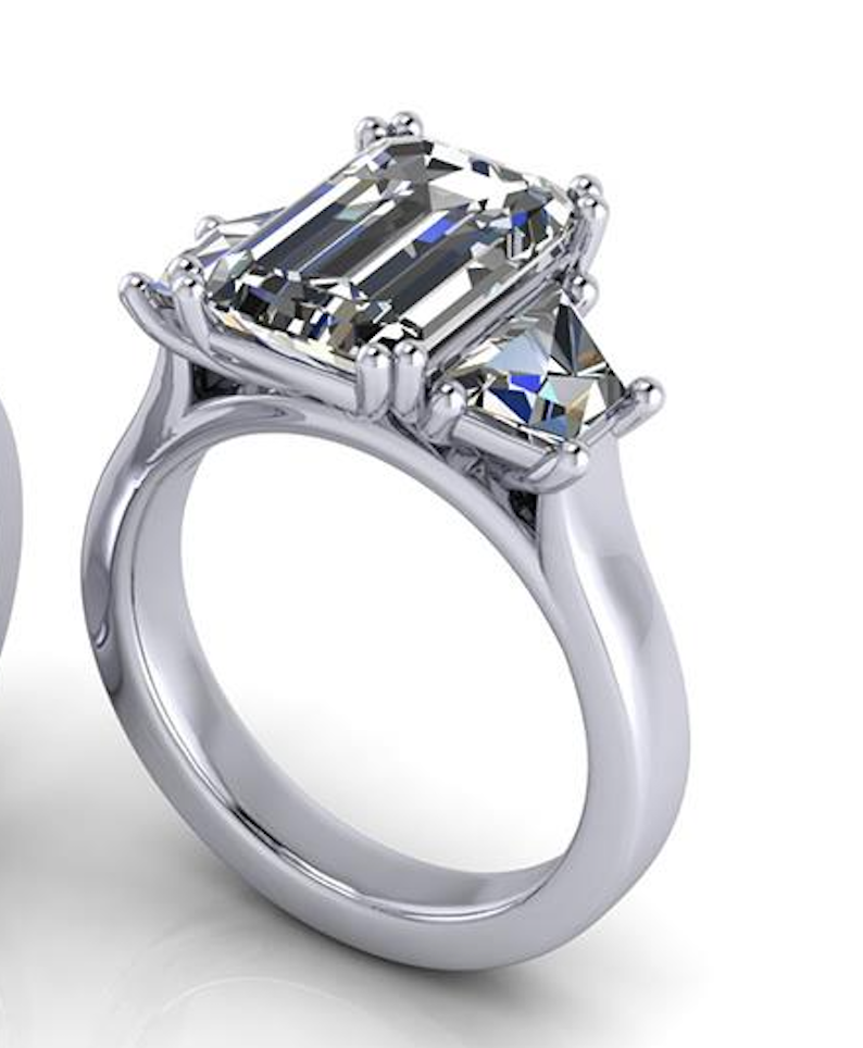 Lab-grown diamond engagement ring with emerald cut center stone and side accents, ethical and sustainable