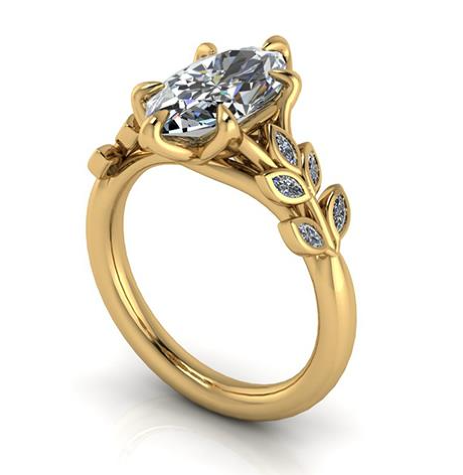 Elegant gold engagement ring with oval lab-grown diamond and leaf-inspired side accents