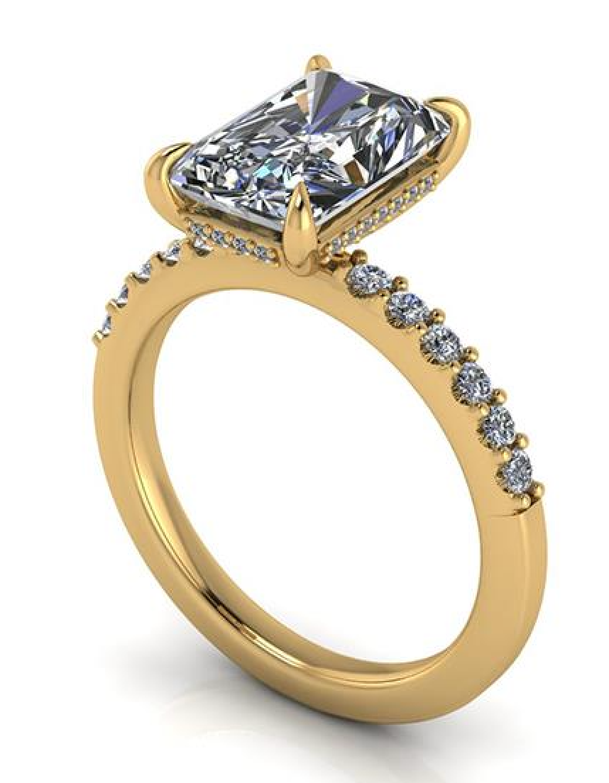 Elegant yellow gold engagement ring with lab-grown diamond and side accents