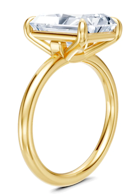 Elegant gold engagement ring with lab-grown diamond, ethical and sustainable design