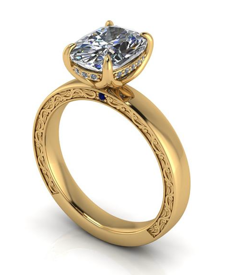 Elegant lab-grown diamond engagement ring with cushion cut stone, gold band, and intricate filigree detailing