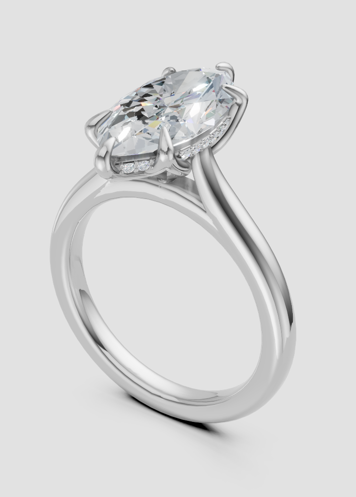 Elegant lab-grown diamond engagement ring with marquise center stone and halo setting