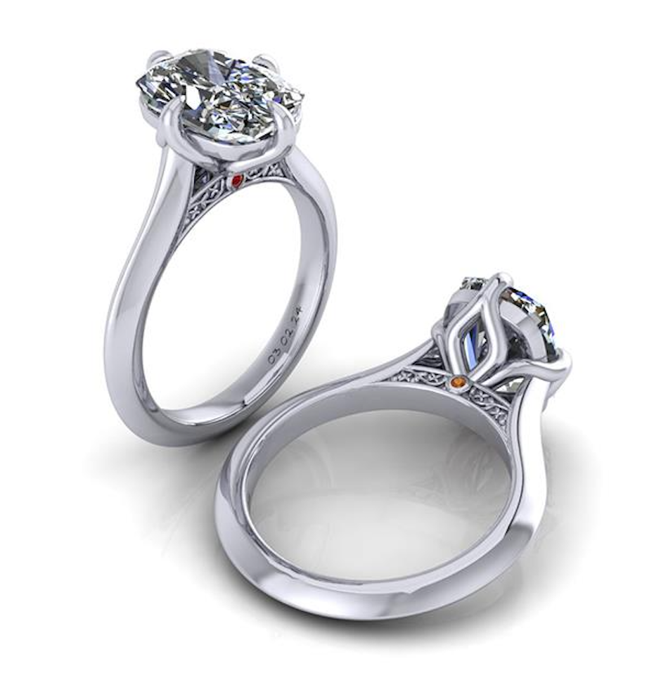 Elegant lab-grown diamond engagement ring with intricate filigree and accent stones, showcasing ethical, sustainable design.
