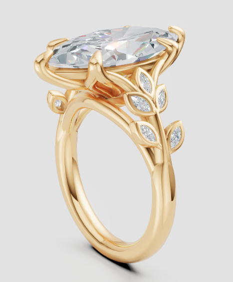 Elegant gold engagement ring with lab-grown diamond and leaf-inspired design