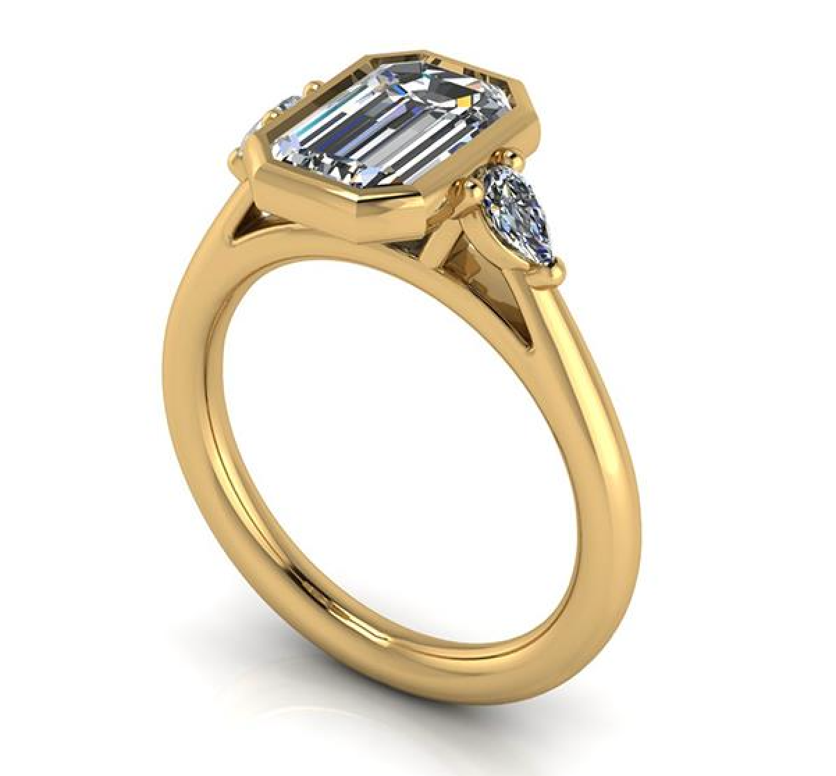 Elegant emerald cut lab-grown diamond engagement ring with pear side stones in yellow gold