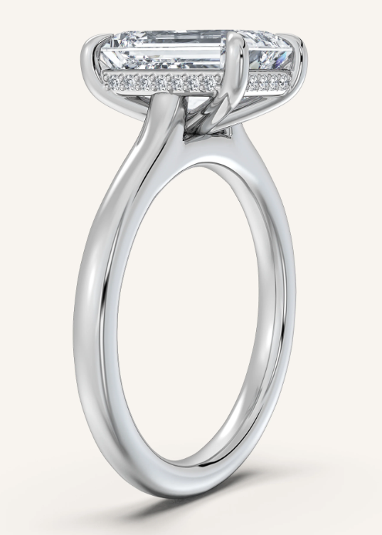 Elegant lab-grown diamond engagement ring with emerald cut center stone and pave band, ethical & sustainable