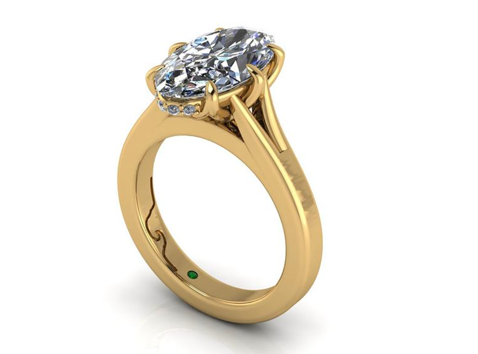 Oval lab-grown diamond engagement ring in yellow gold with side accents and green gem detail