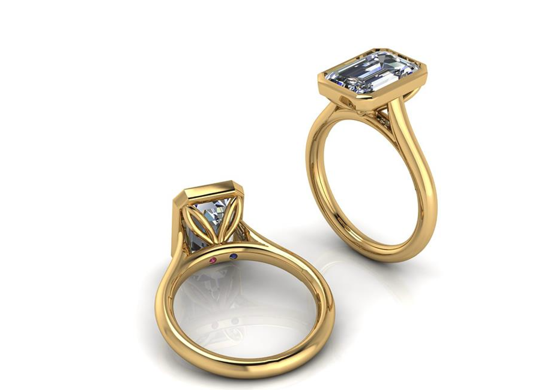 Two gold rings with diamond accents on a white background