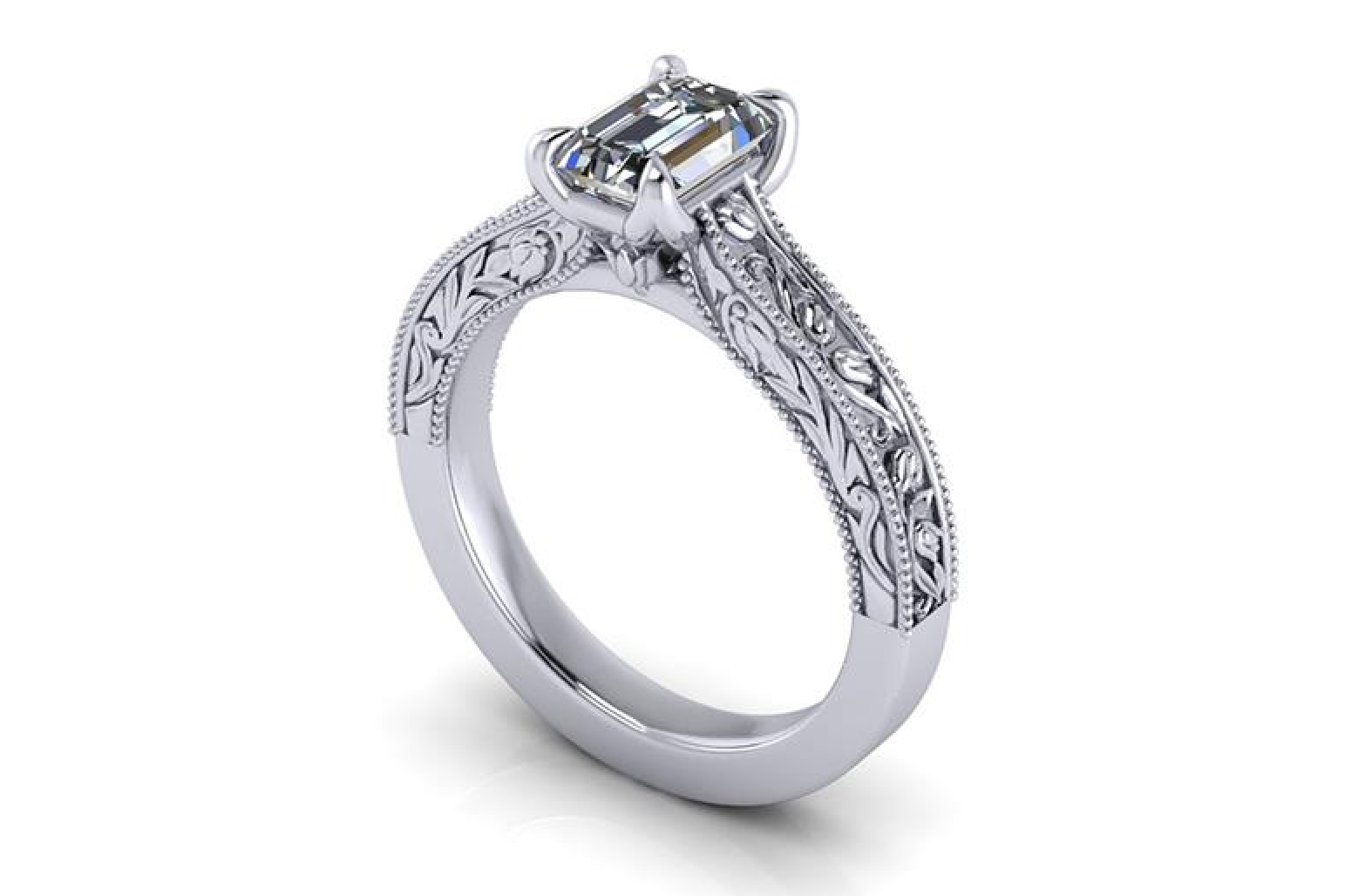 Silver ring with intricate design and central gemstone on a white background
