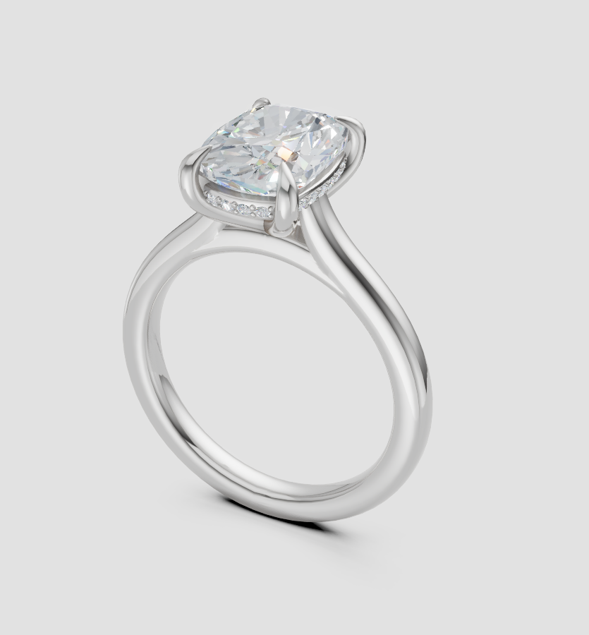 Diamond ring with a central gemstone and smaller stones on a white background
