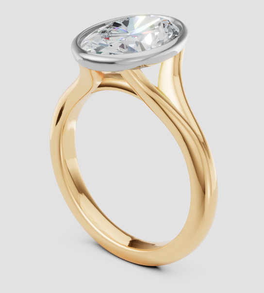 Gold ring with a large diamond on a light gray background