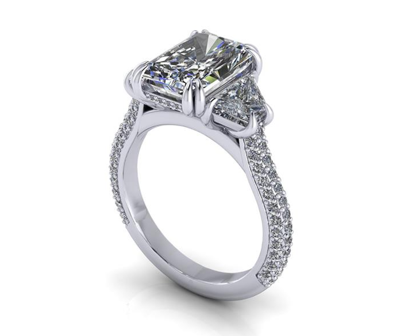 A radiant cut diamond engagement ring in a silver-colored metal setting, featuring a pavé band with small clear stones, shown on a white background.