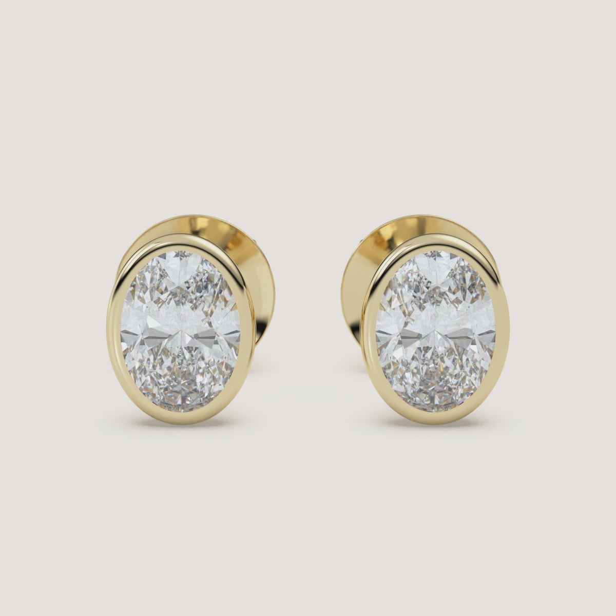 Oval Bezel Diamond Stud Earrings — 2 CTW in 14k Yellow Gold (360° video)