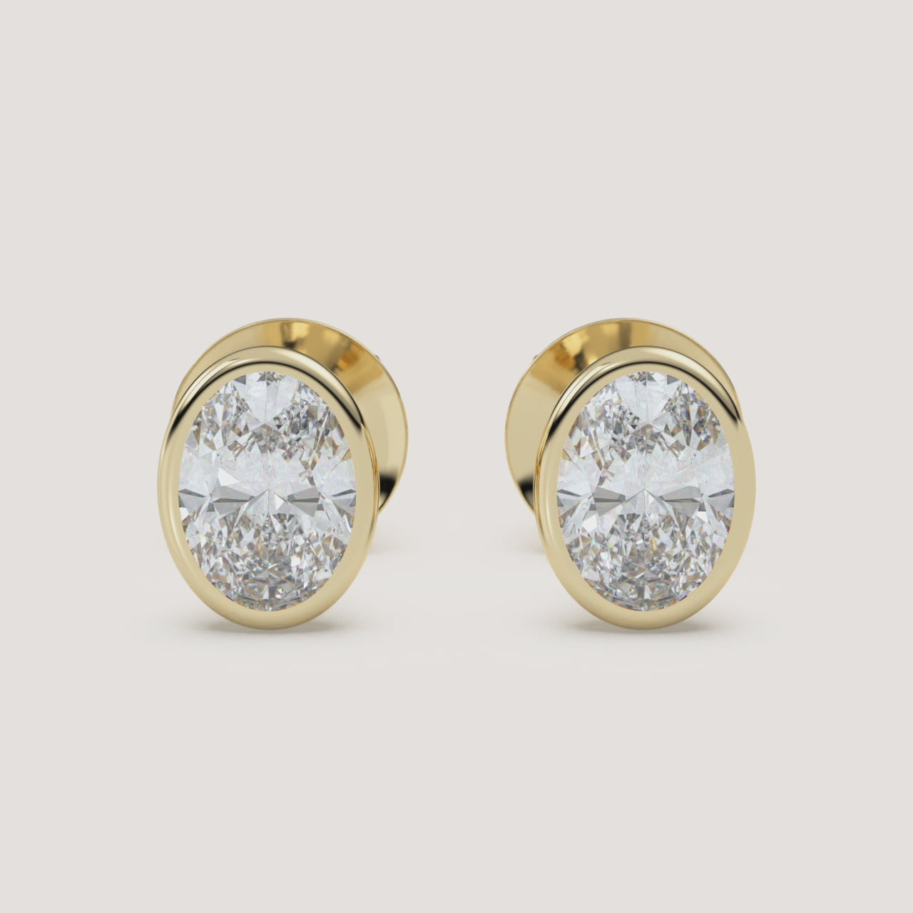 Oval Bezel Diamond Stud Earrings — 2 CTW in 14k Yellow Gold (360° video)