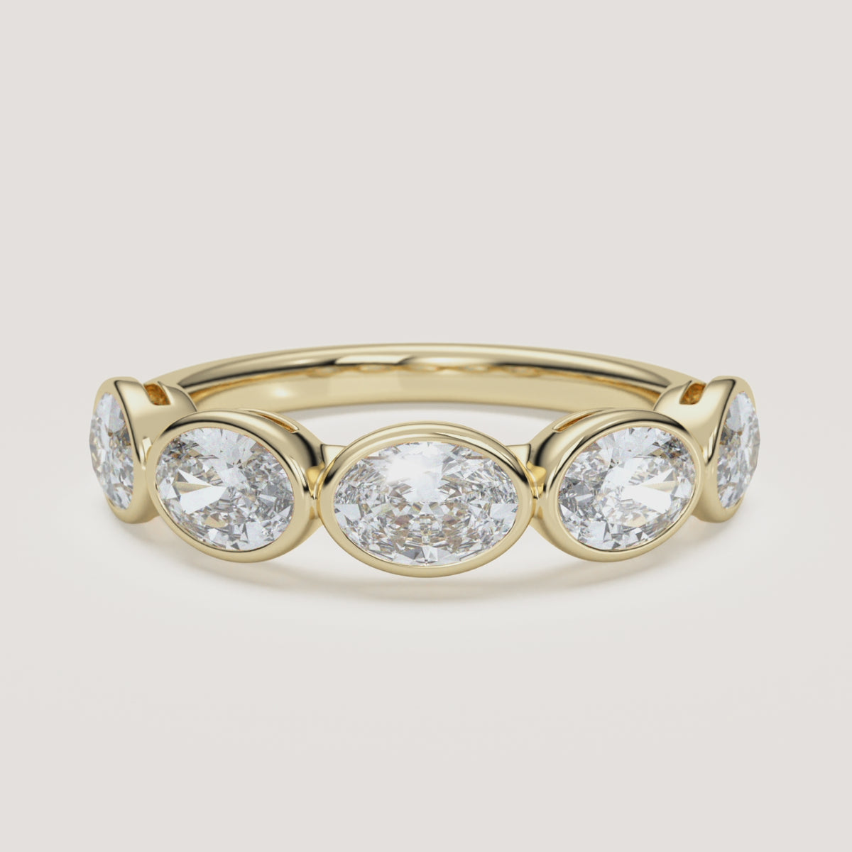 East-West Oval Bezel Half Eternity Band in 14k Yellow Gold (360° video)