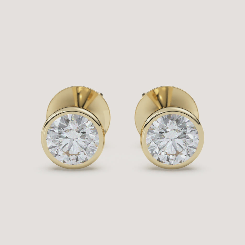 Emerald-Cut Bezel Diamond Stud Earrings — 2 CTW in 14k Yellow Gold (360° video)