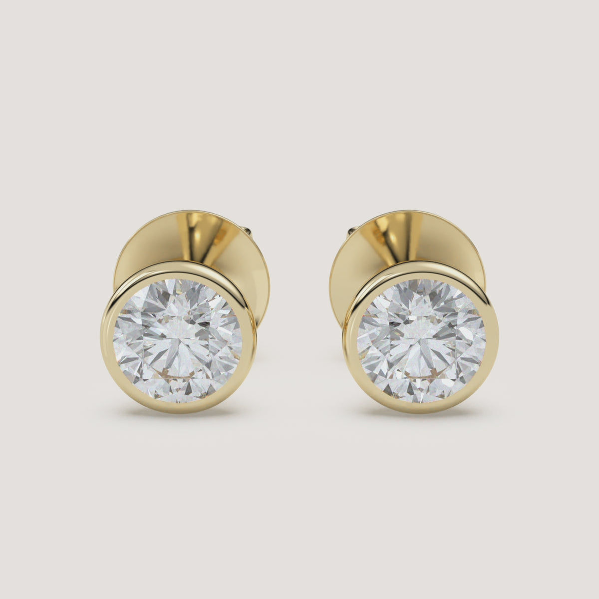 Emerald-Cut Bezel Diamond Stud Earrings — 2 CTW in 14k Yellow Gold (360° video)